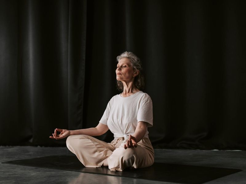 Detail of hands in a meditative position during yoga